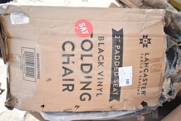 Lancaster Table & Seating black vinyl folding chair box, slightly damaged, marked "2-inch padded seat," barcode visible.