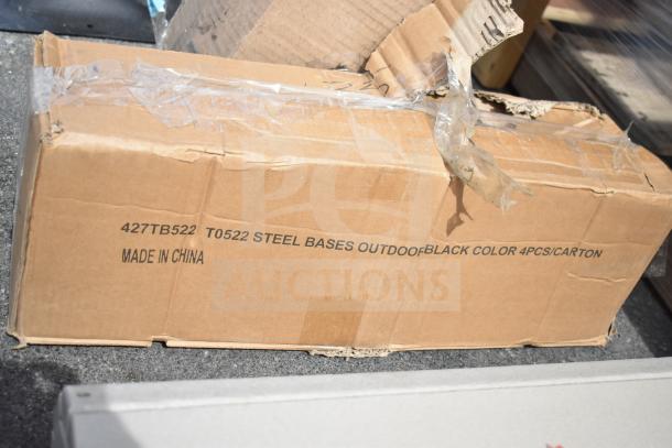 Cardboard box labeled "427TB522 T0522 Steel Bases Outdoor Black Color 4pcs/Carton, Made in China", slightly damaged.