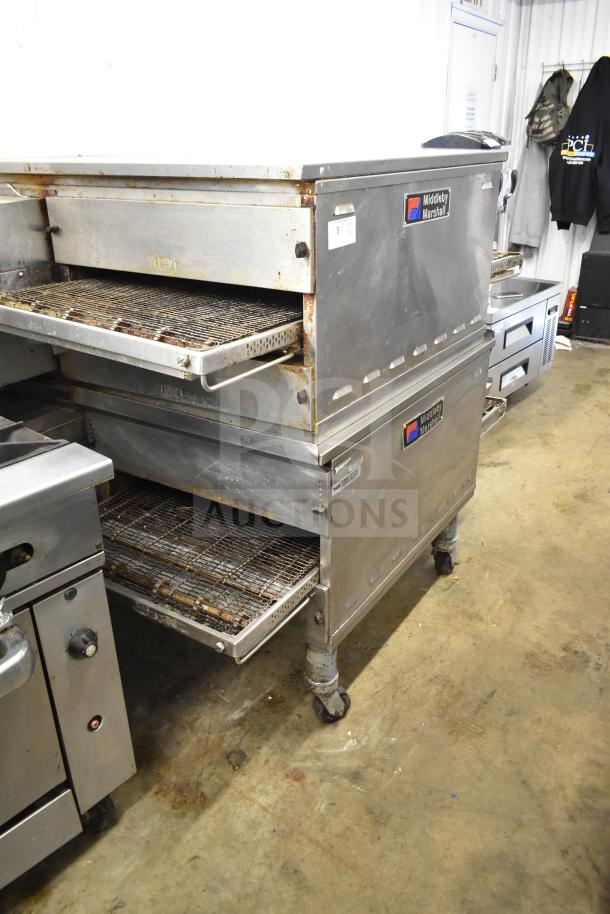 2021 Middleby Marshall PS638G conveyor pizza ovens, natural gas, 89,000 BTU, commercial casters, visible wear, dual units.