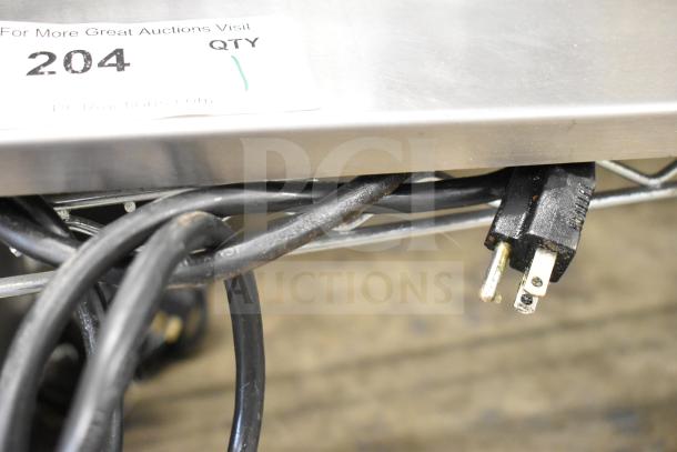 Marshall Air Systems commercial warming shelf, 115 volts, 1 phase; power cord and quantity tag visible.