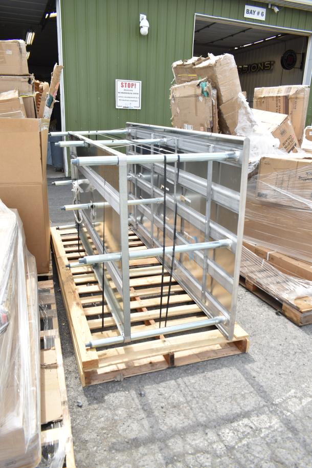 BRAND NEW UG-488 stainless steel table with under shelf, scratch and dent condition, on pallet, sturdy commercial design.
