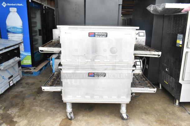 2 Middleby Marshall PS638G conveyor pizza ovens, stainless steel, on casters, natural gas, 89,000 BTU, 2021 model.