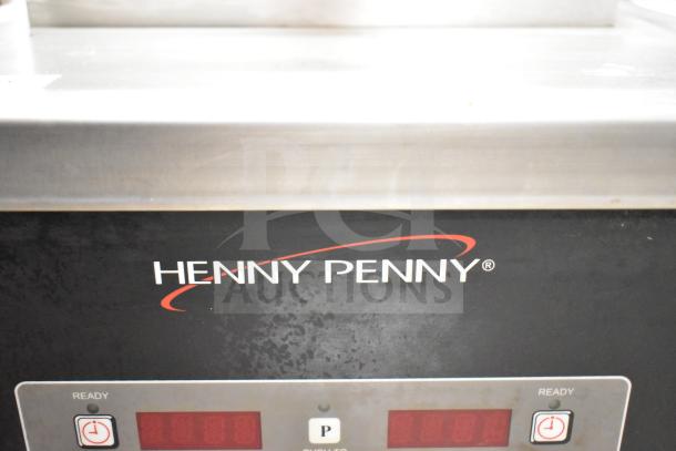 2023 Henny Penny 600 commercial pressure fryer, natural gas, 80,000 BTU, on casters. Logo and digital controls visible.