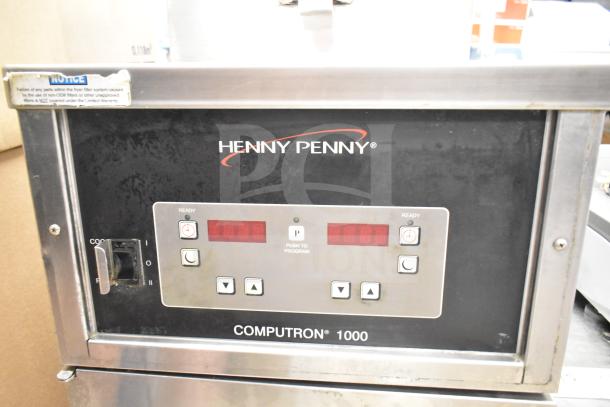 2023 Henny Penny 600 pressure fryer, 80,000 BTU, natural gas, commercial casters, Computron 1000 control panel.