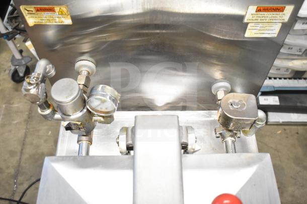 2023 Henny Penny 600 pressure fryer, natural gas, 80,000 BTU, stainless steel, commercial casters, visible warning labels.