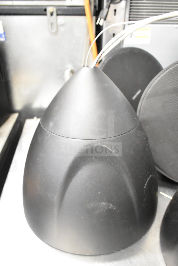 8 items: 1 QSC AD-S6T Speaker, 7 Crestron SAROS PD6T-B-T-EACH Speakers, shown in good condition, black finish.