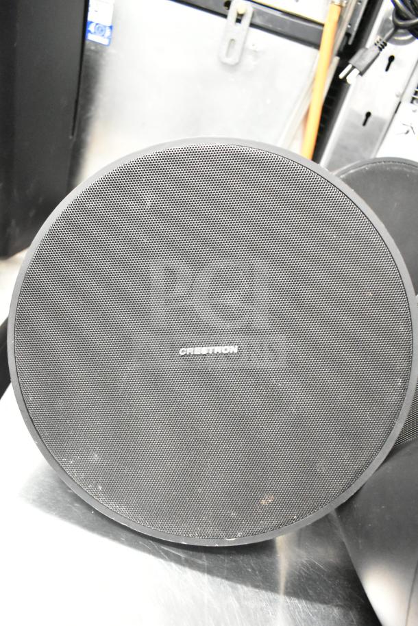 8 various items: 1 QSC AD-S6T speaker and 7 Crestron SAROS PD6T-B-T-EACH speakers. Features visible branding.