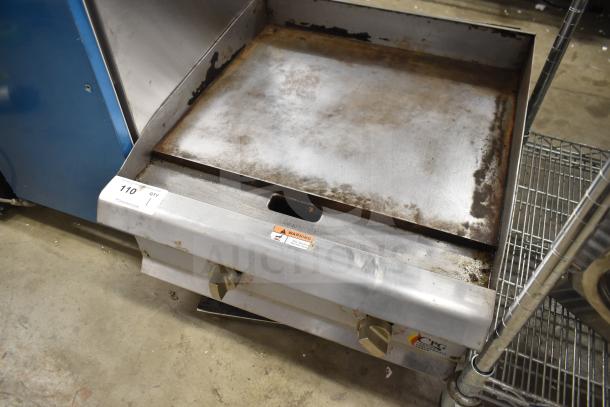 Cooking Performance Group 351GTCPG24 natural gas griddle with flame failure protection, thermostatic controls, visible wear.