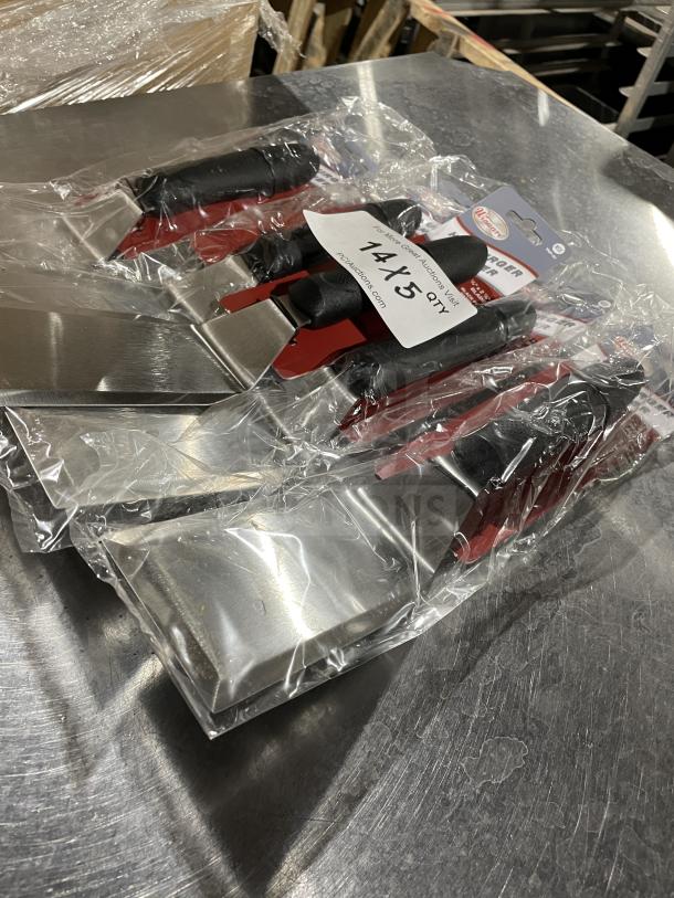 Brand new Winco Winware Series stainless steel hamburger turner, Model TKP-61, in packaging. Commercial-grade tool.