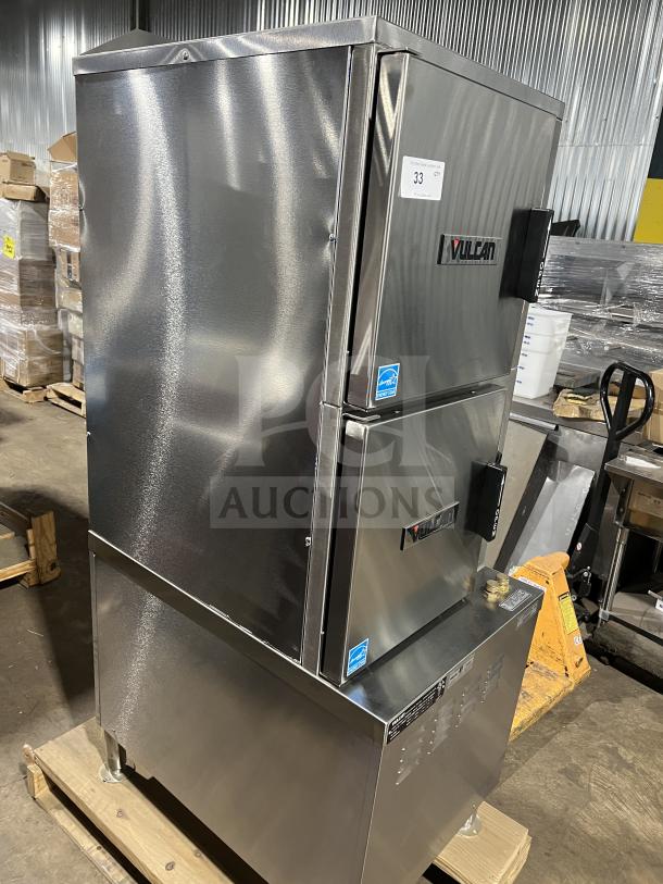 Brand new Vulcan C24ET10 stainless steel dual compartment convection steamer, Energy Star certified, with individual controls and pan rack.