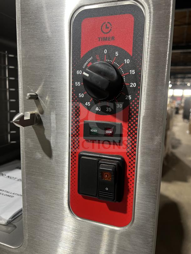 Stainless steel timer control panel on Vulcan C24ET10 convection steamer. Features ready and cook indicators.