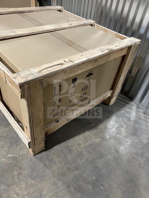 Cookline CGG24M gas griddle, brand new, stainless steel, with back and side splash, manual controls, on legs, out of box.