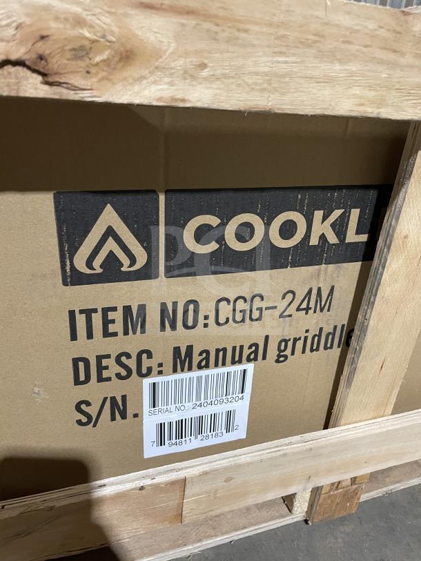 Cookline CGG24M gas griddle, brand new, stainless steel, manual controls, with back & side splash, on legs, SN: 2404093204.