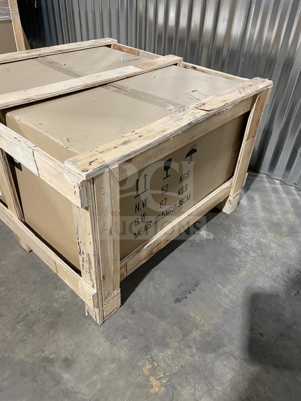 Cookline CGG24M stainless steel gas griddle, new without box, with back and side splash, manual controls, on legs.