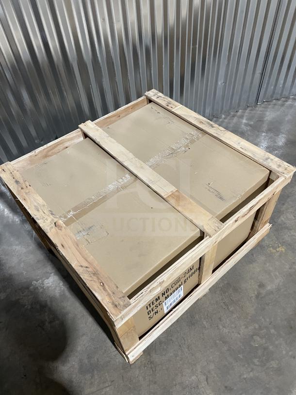 Cookline CGG24M commercial countertop flat griddle, brand new, boxed, with manual controls and splash guards.