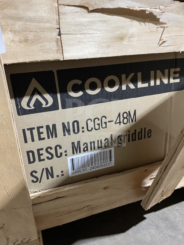 Cookline CGG48M stainless steel gas griddle in new condition, with manual controls, back and side splash, on legs. Serial: 2404093231.
