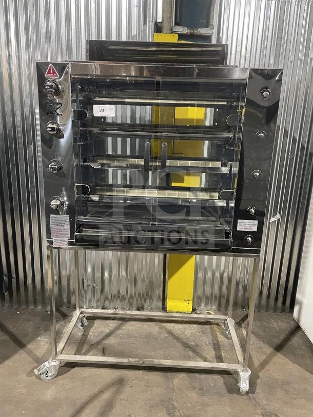 Brand new Rotisol 1160.4 stainless steel gas rotisserie oven with tempered glass doors and casters. Model SN: 9409.