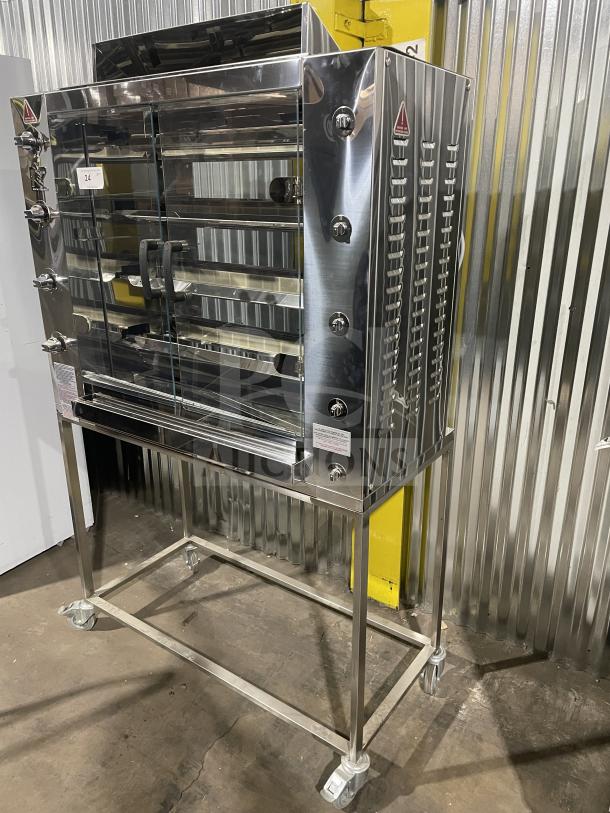 Brand new Rotisol 1160.4 stainless steel rotisserie oven with tempered glass doors on casters, natural gas-powered.