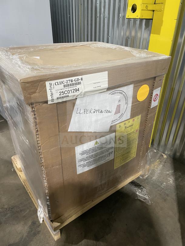 Brand new Traulsen C Series undercounter refrigerator, Model CLUC-27R-GD-R, in packaging. Includes caster wheels, 115V.