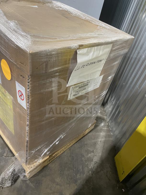 Brand new Traulsen C Series stainless steel undercounter refrigerator in original packaging. Model: CLUC-27R-GD-R. Serial: 25C01294.