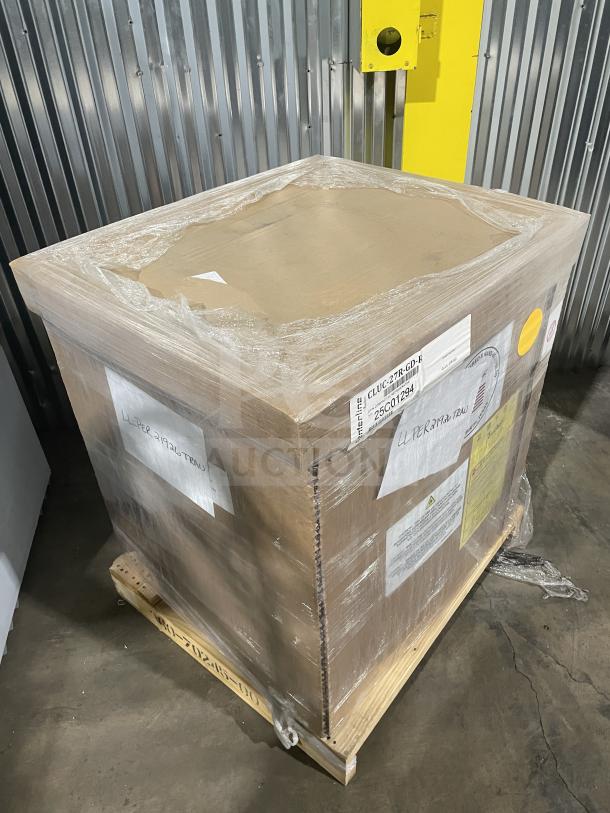 Brand new Traulsen C Series undercounter refrigerator, model CLUC27RGDR, in package, with glass door, on casters.