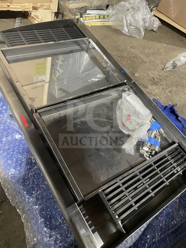 Brand new Star Max Series commercial gas char broiler with stainless steel, cast iron grates, back and side splash.