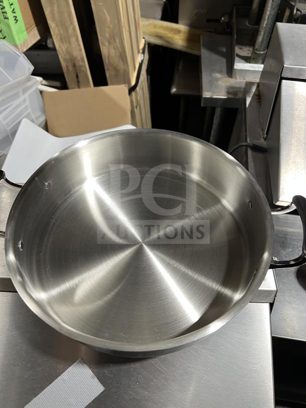 New Bon Chef 6 Qt sauté pot with stainless steel interior, lid, and handles, in pristine condition, ready in box.