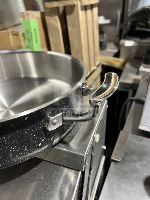 Brand new Bon Chef 6 Qt black saute pot with stainless steel lid, interior, and handles. Commercial quality.