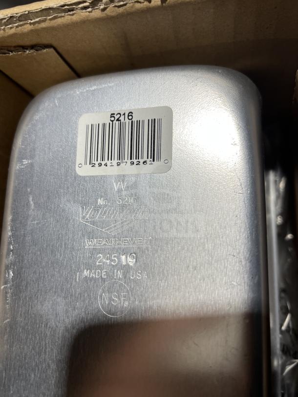 Vollrath Wear-Ever 1.5 lb aluminum cake pan, model 5216, new in box. Features barcode, NSF mark, made in USA.