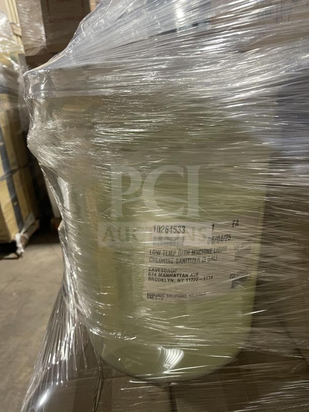 Wrapped pallet containing various commercial kitchen items including 5-gallon chlorine sanitizer. Item details on visible label.