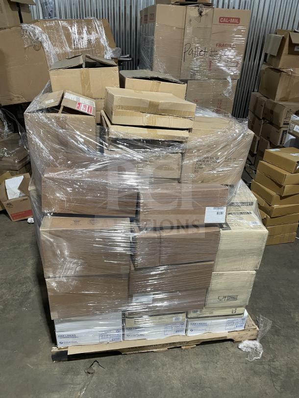 Mixed pallet of commercial items includes trash bin liners, melamine tableware, baguette knives, mixology jars, and cleaning supplies.