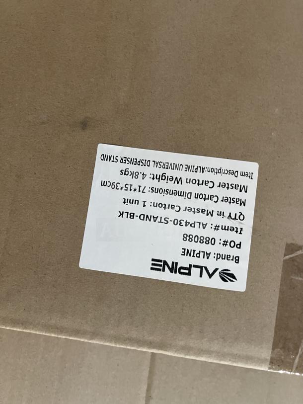 BRAND NEW! Alpine ALP430-STAND-BLK hand sanitizer dispenser floor stand pallet in box. Tags show weight 4.8kgs, dimensions 71x15x39cm.