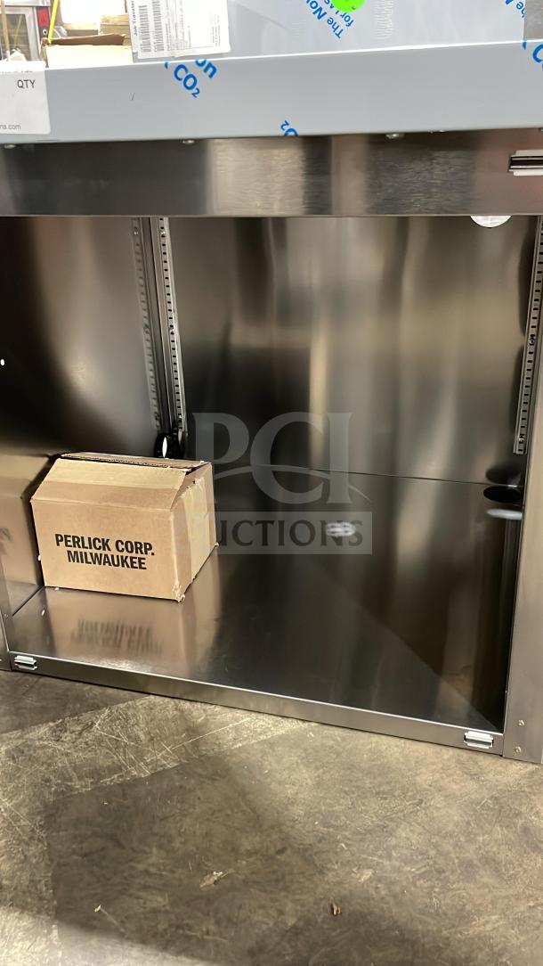Brand new Perlick stainless steel underbar storage cabinet with drainboard top, on legs. Includes original packaging.