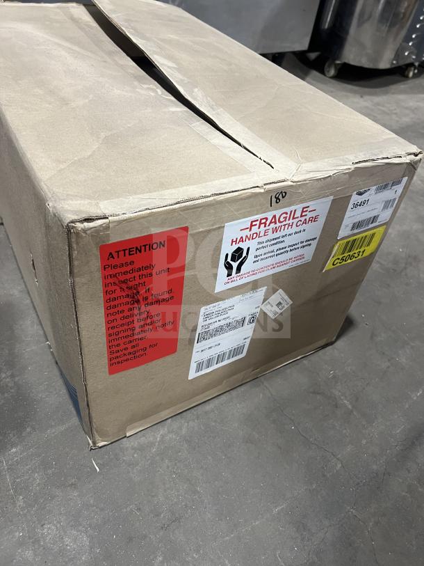 Brand new Vollrath Model 36491 stainless steel ice-cooled food well in original box with handling labels visible.