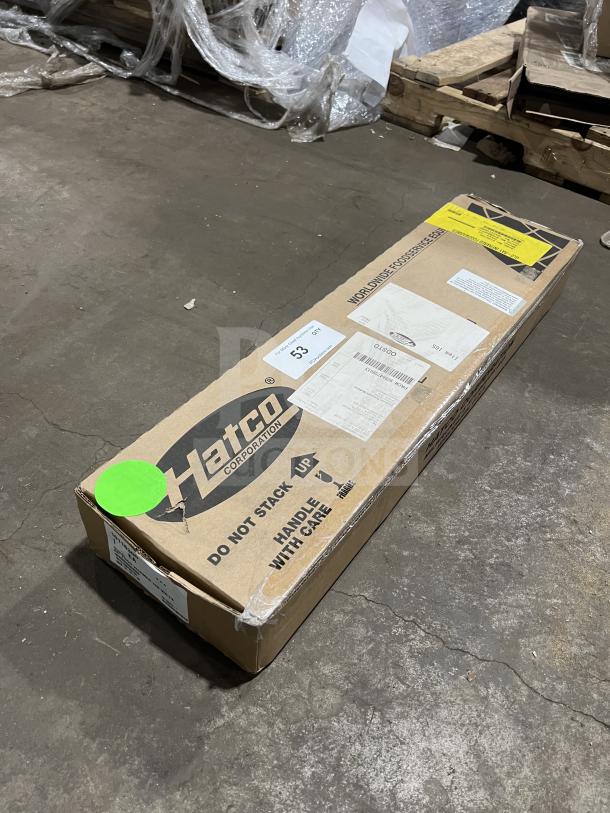 Brand new Hatco GRAH-24-120-I-QS infrared food warmer in box; high wattage, stainless steel, tags and labels visible.