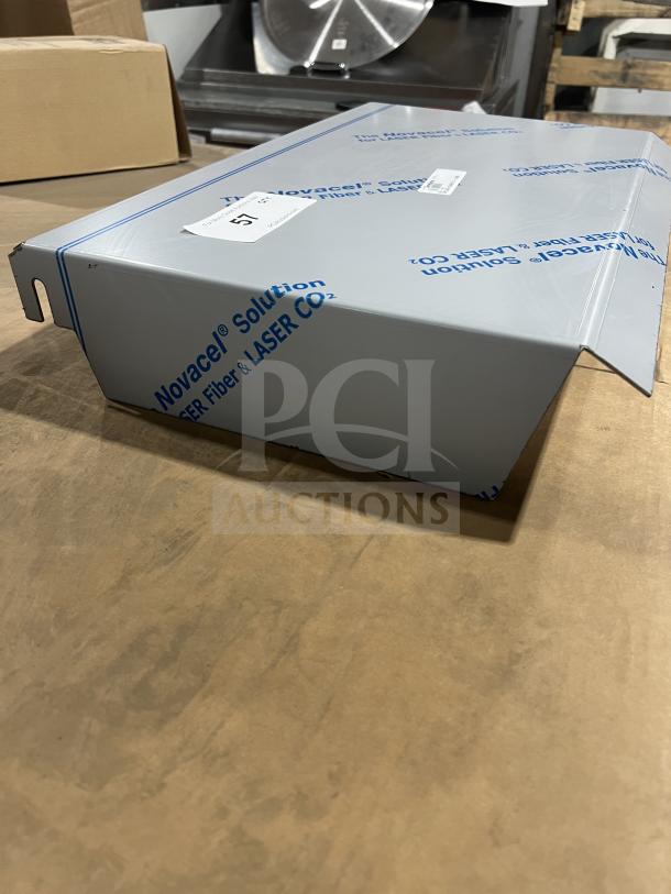 Brand new Cleveland SG-28 stainless steel sneeze guard, commercial-grade. Protective wrap intact, labeled as Novacel Solution.