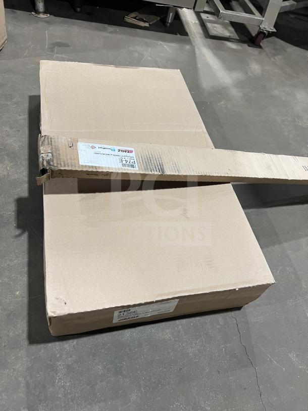 Brand new Eagle Model 2136E 21" x 36" epoxy-coated wire shelf in box. Commercial green, pristine condition, labeled packaging.