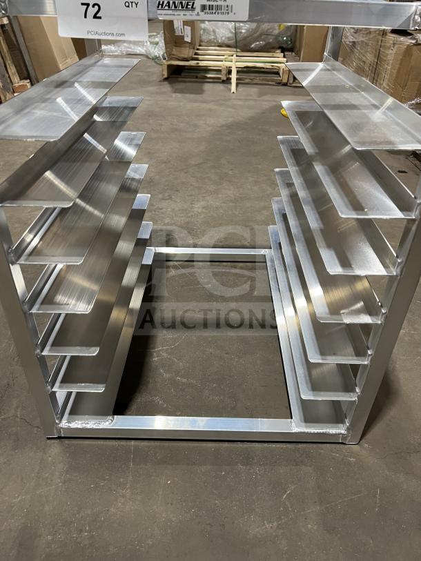 Brand new Bunn half-size end load pan rack, stainless steel, multiple shelves, ideal for commercial kitchens. Auction item #72.