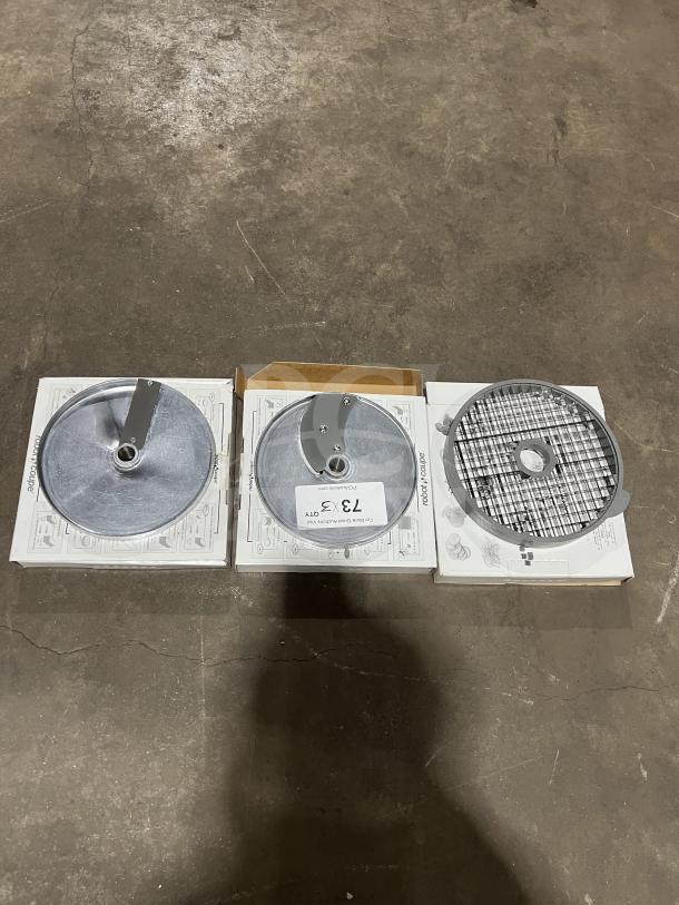 Brand new Robot Coupe 9/16" slicing disc, model 28131, in original box. Features durable metal construction.