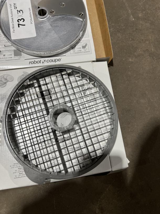 Brand new Robot Coupe 9/16" slicing disc, model 28131, in box. Features durable grid design. Ideal for commercial use.