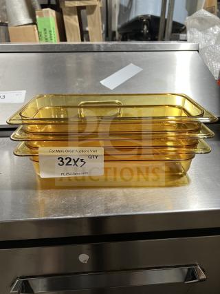 Brand new Cambro 32HP 1/3 size high heat polycarbonate food pan, stack of three, with auction label "32X3 QTY".