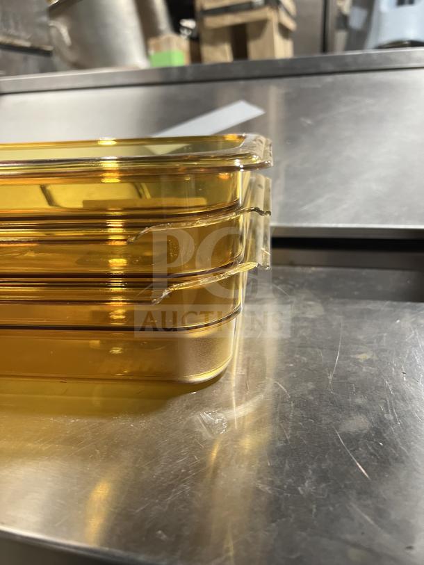 Brand new Cambro polycarbonate 1/3 size high heat food pan, model 32HP, clear amber, stackable, durable commercial quality.