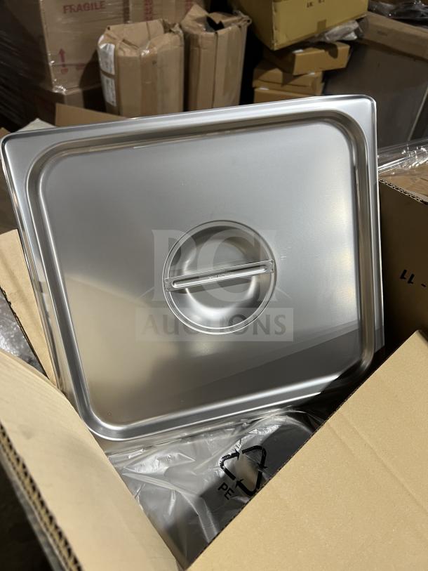 Brand new 2/3 Size Solid Cover, Model: 607230C, in box. Silver finish, commercial-grade. Box marked "FRAGILE."