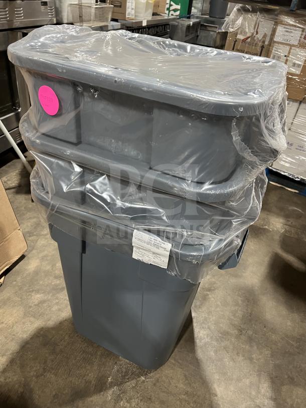 Brand new Rubbermaid Commercial Gray Square Brute 40 Gallon Trash Can, Model FG353600, wrapped in plastic.