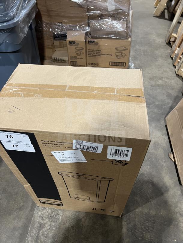 Brand new Rubbermaid Slim Jim Series commercial black trash can, Model 1883611, in box with labels visible.