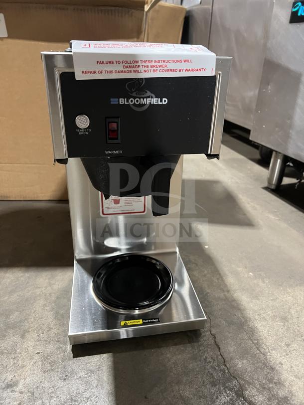 Brand new Bloomfield Koffee King Series stainless steel coffee brewer, model 48-8542-D1-120V, includes brew basket.