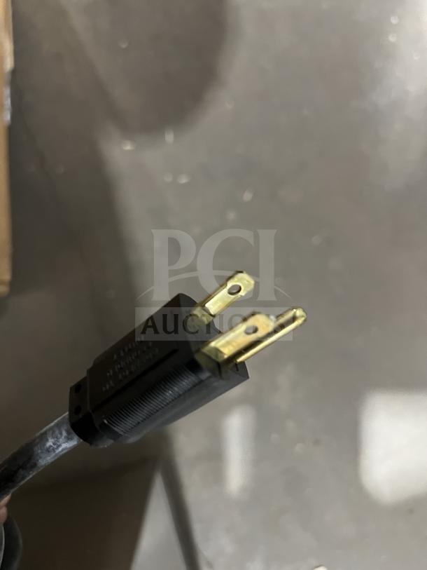 Close-up of the power plug for a Bloomfield Koffee King commercial coffee brewer, model 48-8542D1120V, new condition.