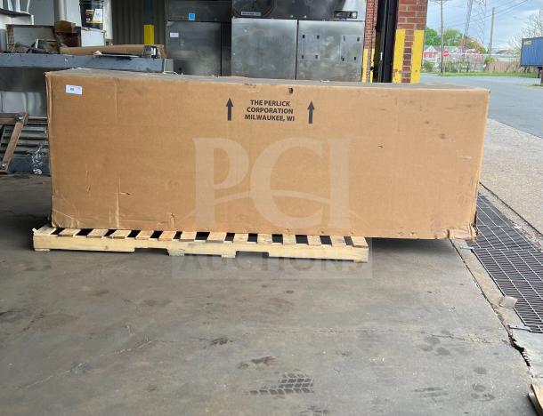 Brand new Perlick 4-door black bar back refrigerator, model BBS108RFYSSH1, in box with stainless steel worktop.