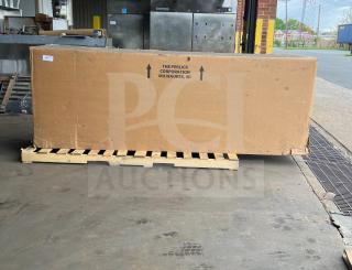 Brand new Perlick 4-door black bar back refrigerator, model BBS108RFYSSH1, in box with stainless steel worktop.