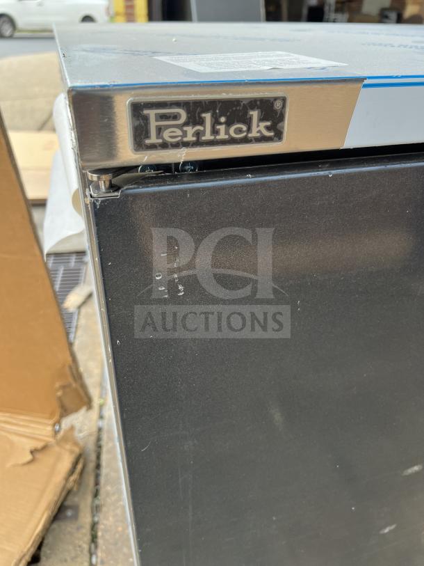 Brand new Perlick 4-door bar back refrigerator, model BBS108RFYSSH1, with stainless steel worktop and wired rack.